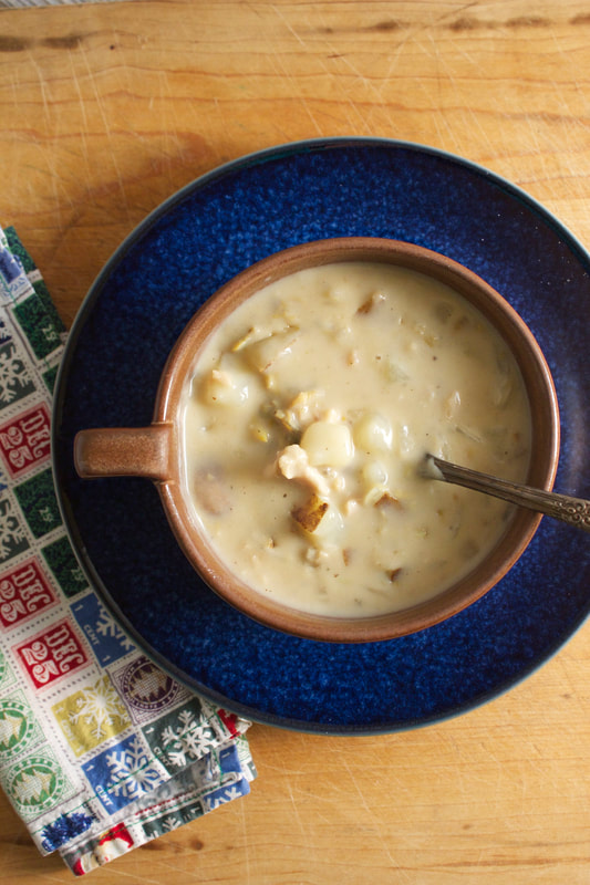 Clam chowder is one of our favorite soups of all time and this one does not disappoint. Rich creamy chowder with hearty potatoes and clams...it's more than just dinner, it's a culinary experience for the senses. #soup #chowder #clams #recipes #foodblogger #foodie #yum 