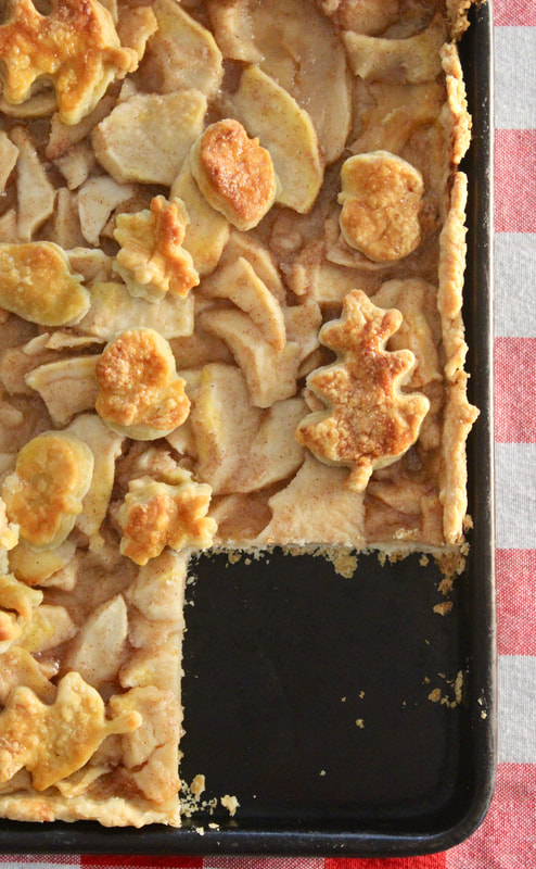 Apple Slab pie with a piece cut out