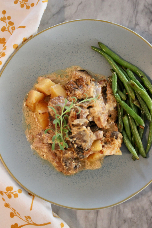 Slow Cooker Pork Chops in Cream Sauce with Potatoes and Mushrooms