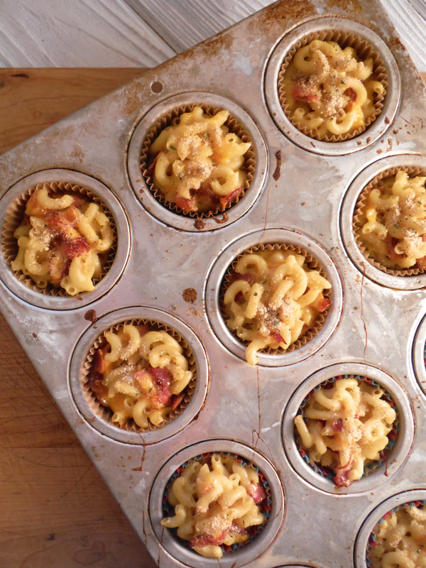 Bacon mac and cheese cupcakes in a muffin tin