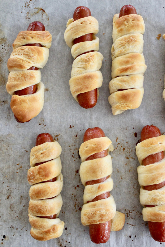 Mummy Dogs (hot dogs cooked in croissant dough)