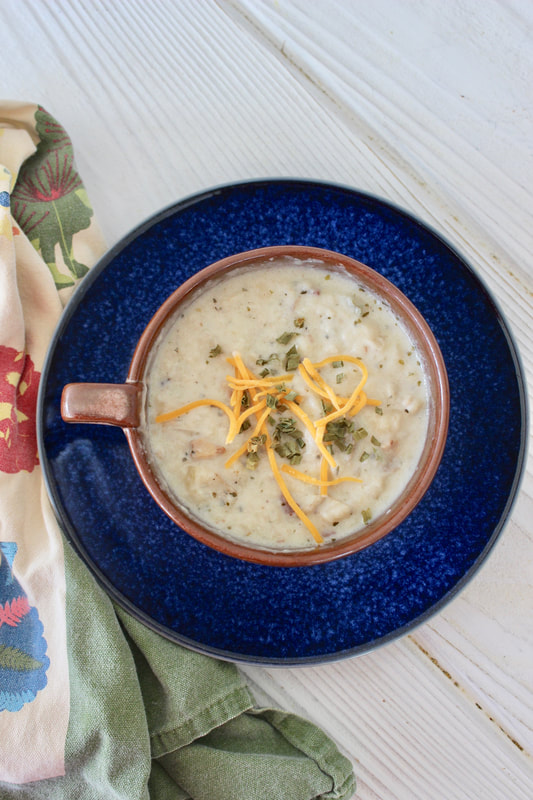 Creamy Slow Cooker Potato Soup with cheese