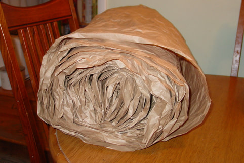 Roll of repurposed paper