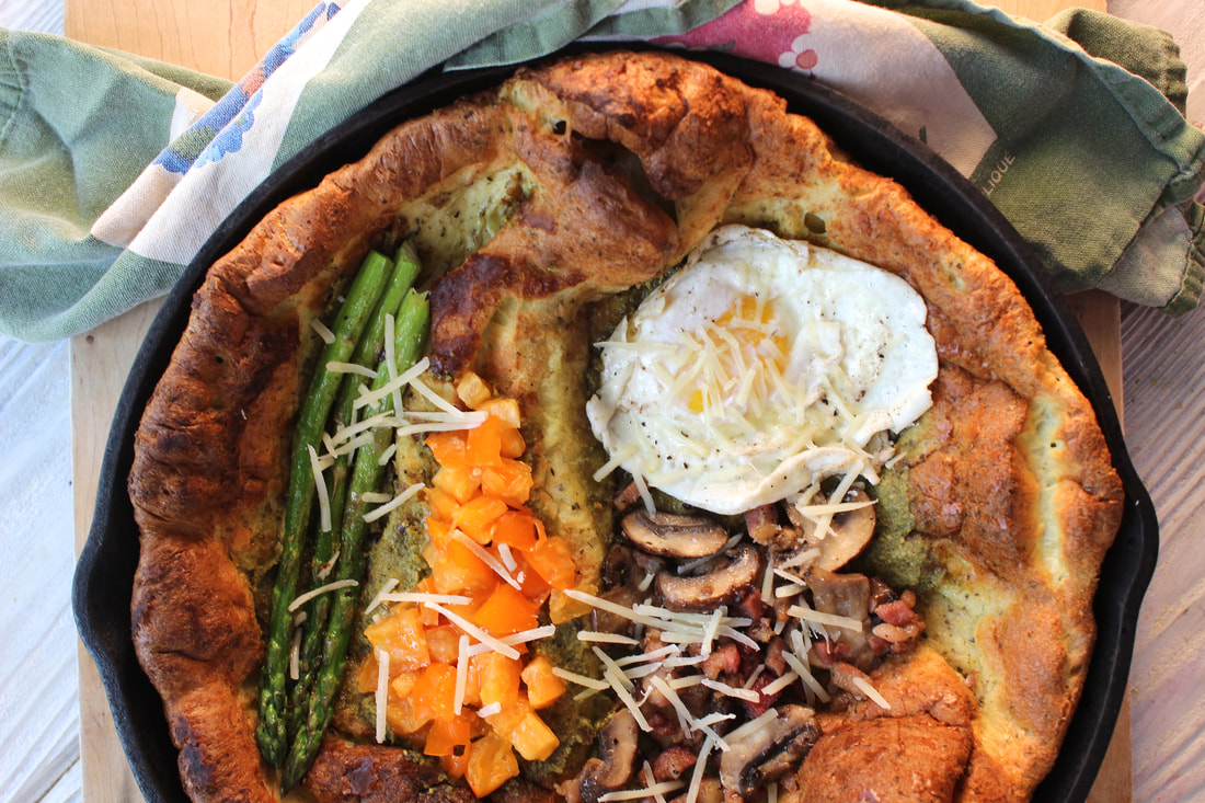Savory Dutch Baby with an egg on top